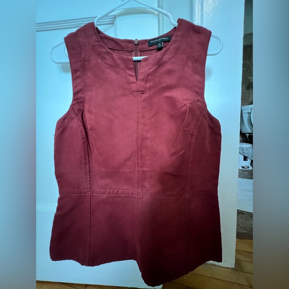 Burgundy, soft, form fitting top by Banana Republic.